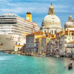 Italy beauty, gigantic cruise ship leaving Venice, gondola on Grand canal, cathedral Santa Maria della Salute, Venezia